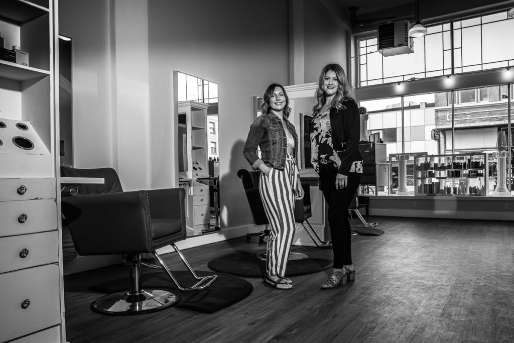 Chelle Sollars and Holly Shepherd, owners of NW Style Loft Salon and Boutique. Stand in there empty salon